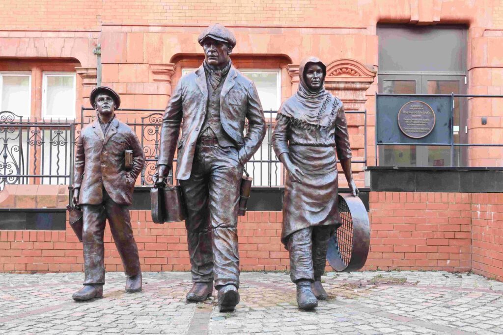 Library card featuring three Wigan miners